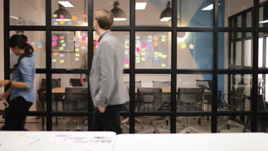 Coworkers arriving for a team meeting