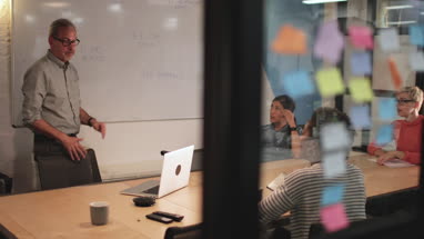 Staff in a late night team meeting