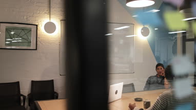 Staff in a late night team meeting