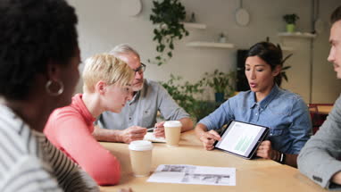 Businesswoman giving a presentation in a business meeting