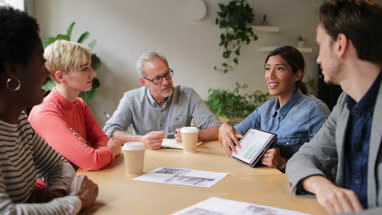 Businesswoman giving a presentation in a business meeting