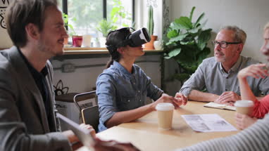 Coworkers working on VR headset technology