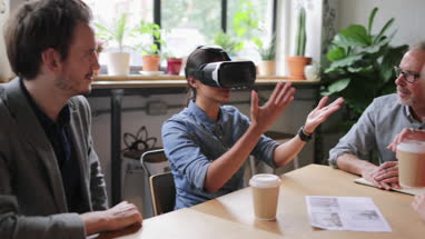 Coworkers working on VR headset technology