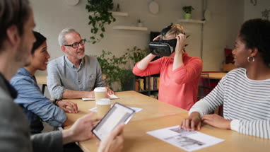 Coworkers working on VR headset technology
