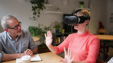 Coworkers working on VR headset technology