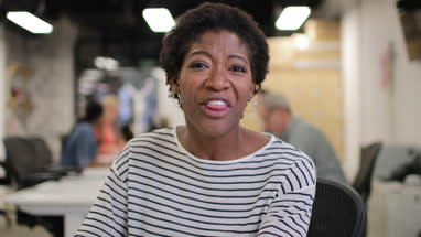 African american businesswoman on a videocall in an office