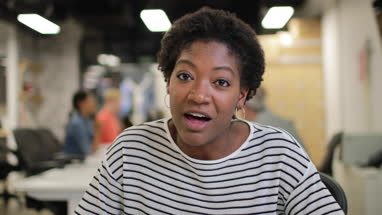 African american businesswoman on a videocall in an office