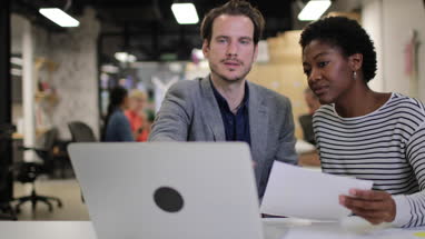Coworkers in a late meeting