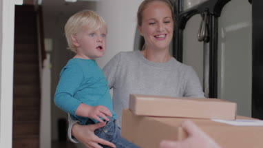 Young family receiving a home delivery
