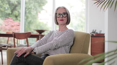 Portrait of a mature adult female at home