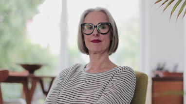 Portrait of a mature adult female at home
