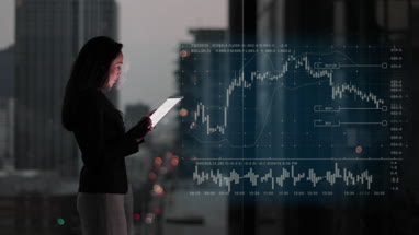 Conceptual shot of businesswoman with infographics digital composite