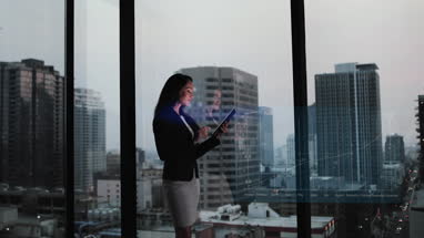 Conceptual shot of businesswoman with infographics digital composite