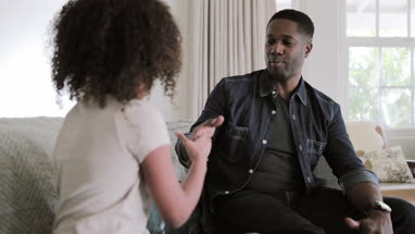 Father and daughter doing a cool handshake