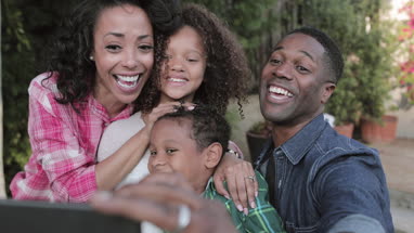 African American family taking a selfie